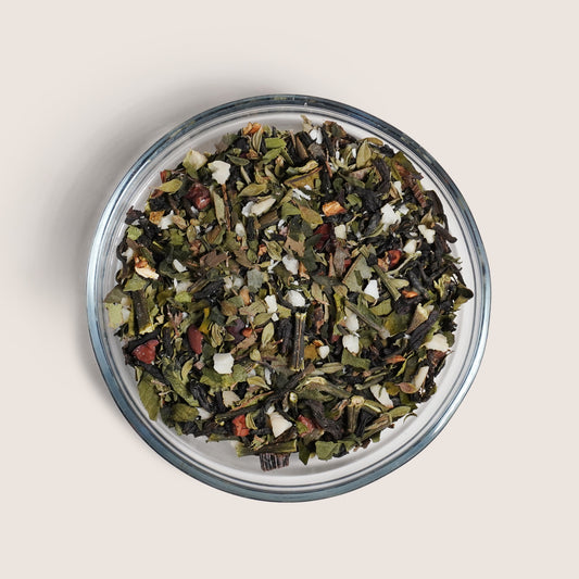 Loose leaf Almond Earl Grey tea in circular glass dish